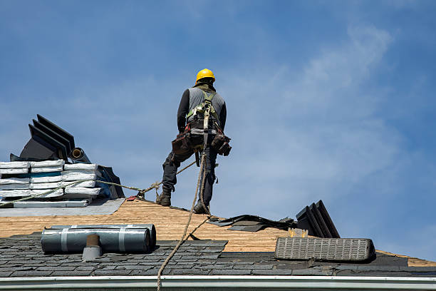 Professional Roofing technician working in East Amherst, NY